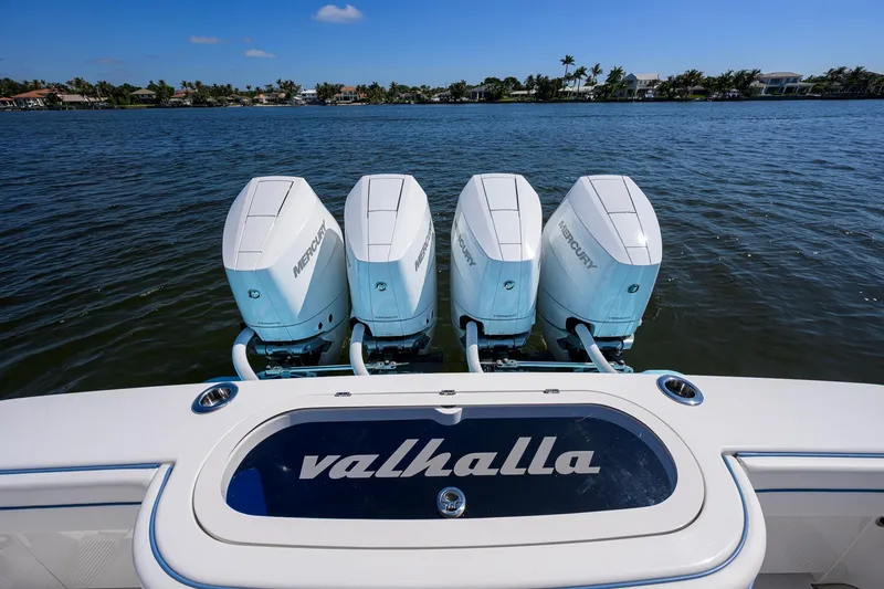 Slide: The Image of 2025 Valhalla Boatworks V-41 with four Mercury outboard engines on water. - 38
