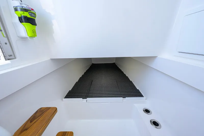 Slide: The Image of 2025 Valhalla Boatworks V-41 interior with wooden steps and storage compartment. - 43