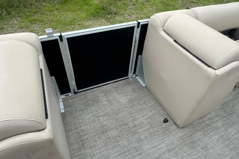 Slide: The Image of Interior seating of a 2021 Bentley Pontoons 240 CRUISE with beige upholstery. - 15