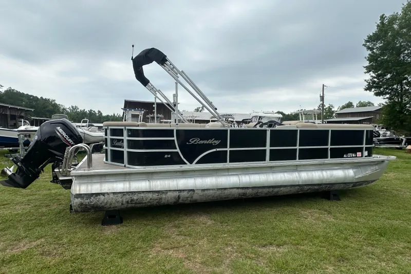 Slide: The Image of 2021 Bentley Pontoons 240 CRUISE pontoon boat on grass with Mercury outboard motor. - 6
