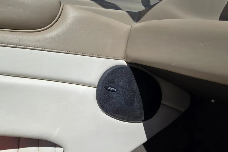 Slide: The Image of Interior of 1999 Bayliner 1850 Capri SS with Jensen speaker. - 13