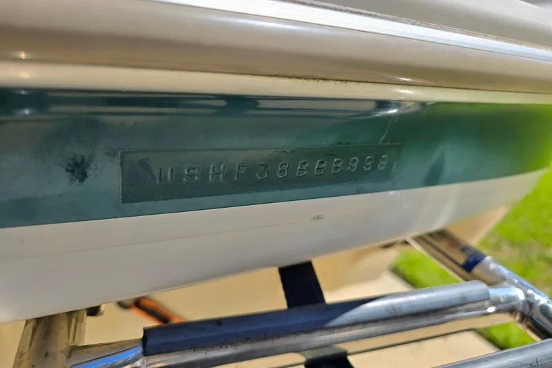 Slide: The Image of 1999 Bayliner 1850 Capri SS boat hull identification number (HIN) close-up. - 27