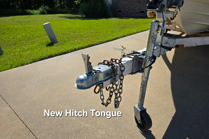 Slide: The Image of New hitch tongue on 1999 Bayliner 1850 Capri SS trailer in driveway. - 4