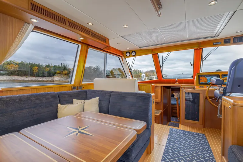 Slide: The Image of Luxurious interior of 2014 Grand Banks 46 Eastbay SX yacht with scenic window views. - 27