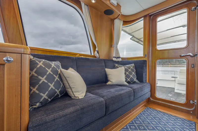 Slide: The Image of Luxurious interior of 2014 Grand Banks 46 Eastbay SX yacht with plush seating. - 32