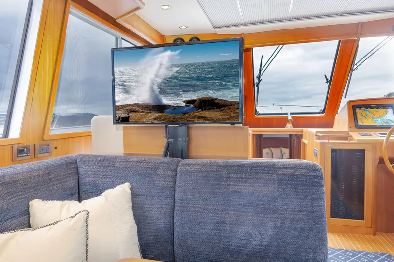 Slide: The Image of Luxurious 2014 Grand Banks 46 Eastbay SX yacht interior with ocean view and modern amenities. - 34