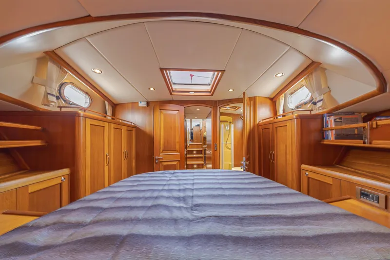 Slide: The Image of Luxurious 2014 Grand Banks 46 Eastbay SX yacht interior with elegant wood finish and cozy cabin. - 59