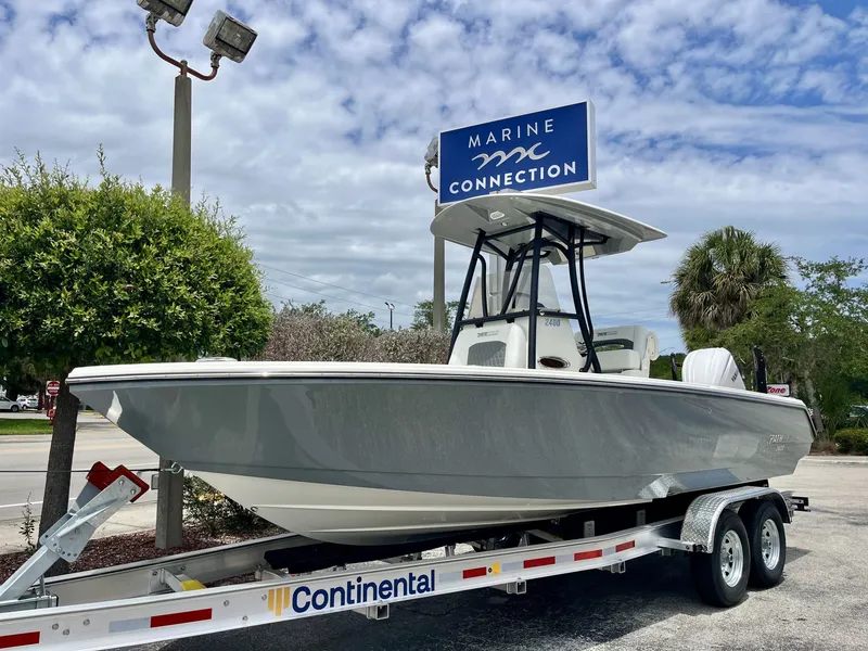 Slide: The Image of 2026 Pathfinder 2400 Open boat on Continental trailer at Marine Connection. - 2