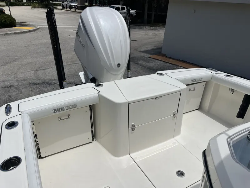 Slide: The Image of Pathfinder 2400 Open 2026 boat rear with engine and storage compartments. - 22