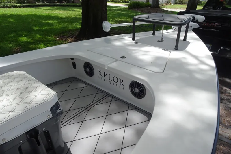 Slide: The Image of 2024 Xplor X18 Delta D18 boat interior with seating and deck details. - 12