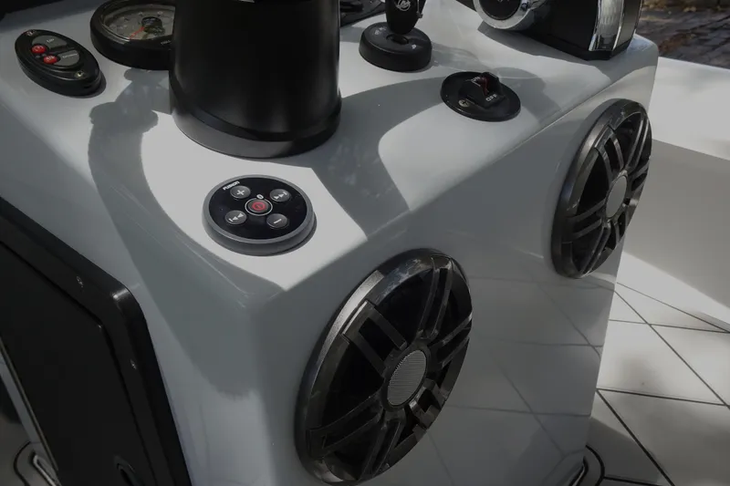 Slide: The Image of Control panel of 2024 Xplor X18 Delta D18 boat with speakers and controls. - 19