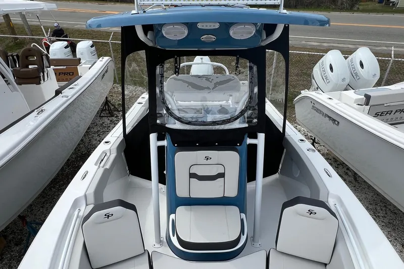 Slide: The Image of 2026 Sea Pro 225FLX Sandbar boat with sleek design and modern seating. - 2