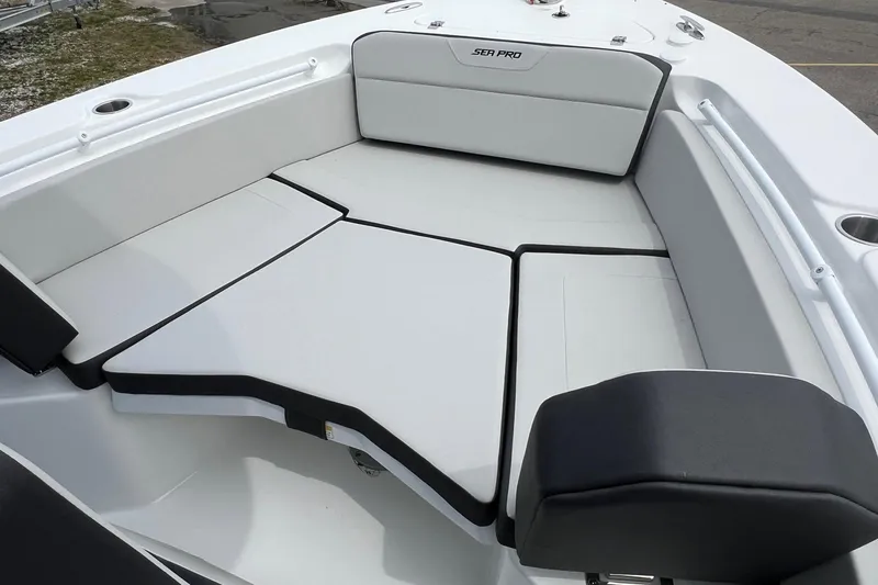 Slide: The Image of 2026 Sea Pro 225FLX Sandbar boat interior with cushioned seating area. - 3