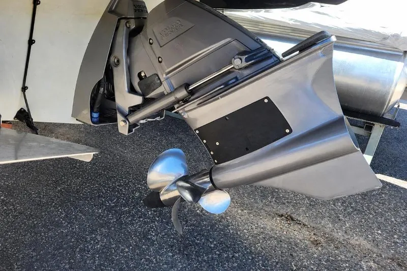 Slide: The Image of Close-up of 2019 Crownline 255 SS SURF boat propeller and outdrive on asphalt. - 5