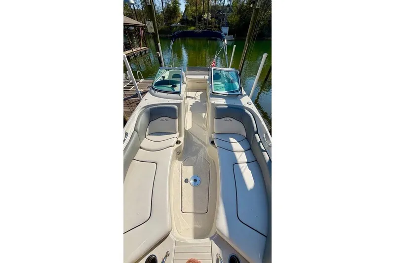 Slide: The Image of 2008 Sea Ray 240 Sundeck boat interior with spacious seating and sleek design. - 5