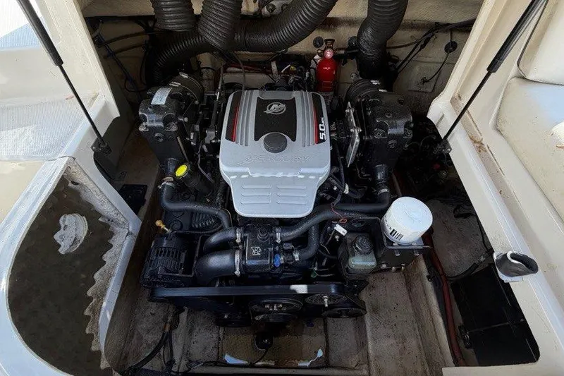 Slide: The Image of Engine compartment of a 2008 Sea Ray 240 Sundeck boat. - 8