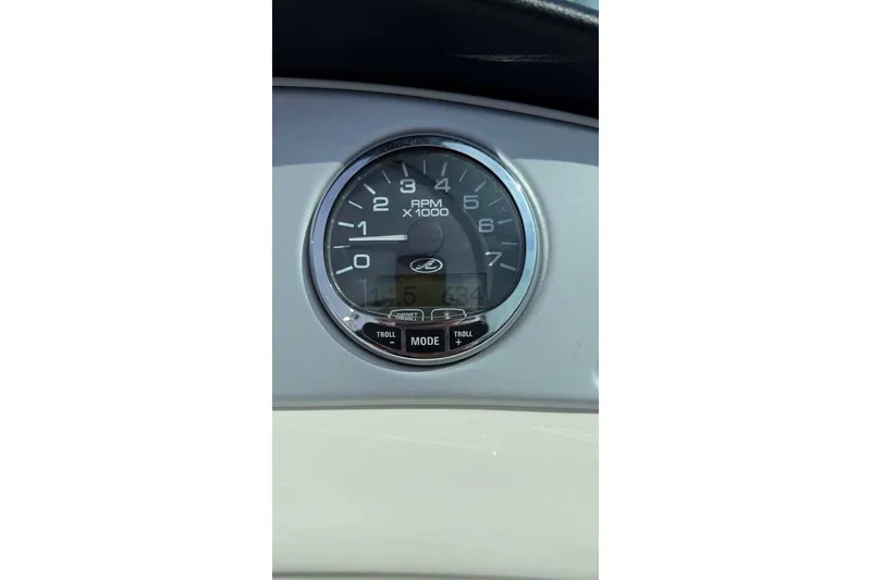 Slide: The Image of Tachometer of 2008 Sea Ray 240 Sundeck displaying RPM and digital readout. - 9