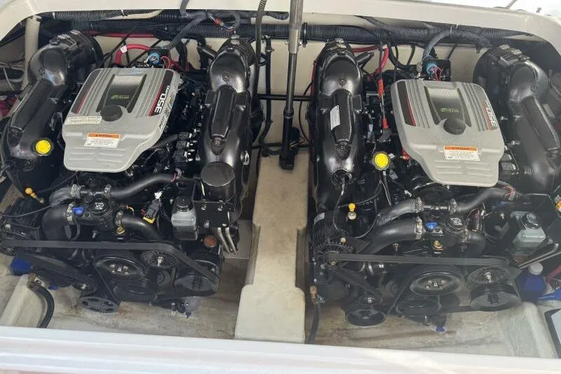 Slide: The Image of Twin engines in a 2013 Formula 310 FX5 boat, showcasing powerful marine performance. - 31