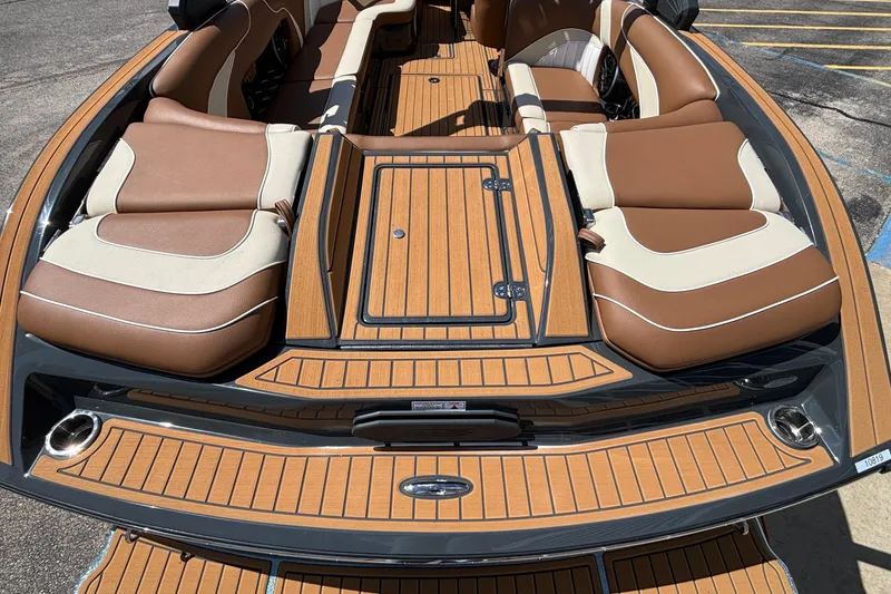 Slide: The Image of Luxury interior of 2026 MB B52 23 Alpha boat with brown and cream seating. - 10