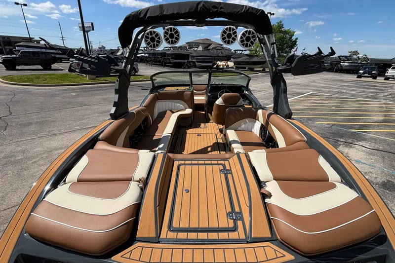 Slide: The Image of 2026 MB B52 23 Alpha boat interior with luxurious seating and advanced sound system. - 11