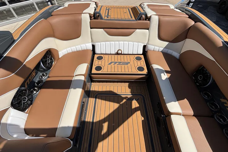 Slide: The Image of Luxurious interior of 2026 MB B52 23 Alpha boat with brown and cream seating. - 19