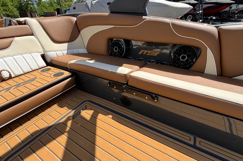 Slide: The Image of Luxurious interior of 2026 MB B52 23 Alpha boat with premium seating and sound system. - 22