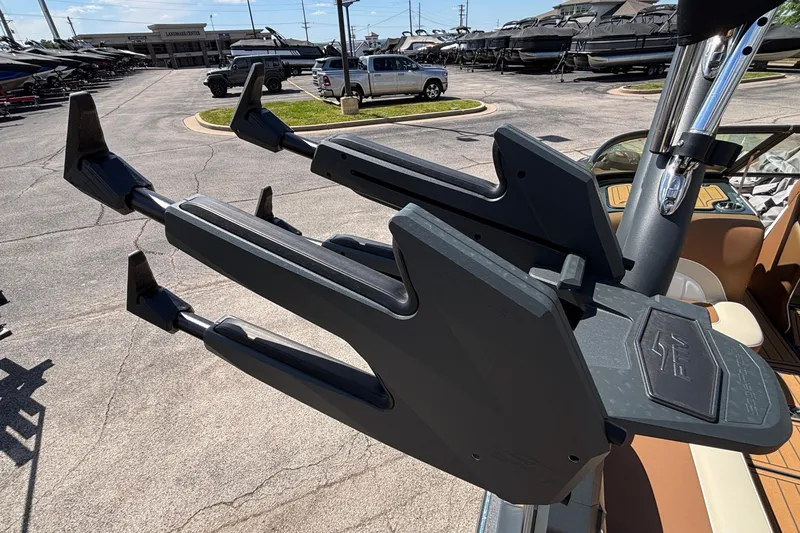 Slide: The Image of Wakeboard rack on MB B52 23 Alpha boat, 2026 model, in a dealership lot. - 26