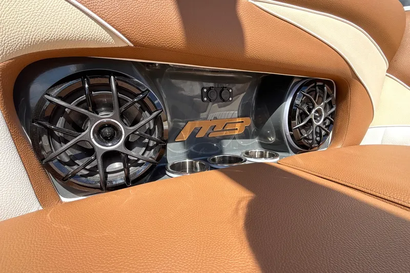 Slide: The Image of Interior of 2026 MB B52 23 Alpha with premium speakers and cup holders. - 30