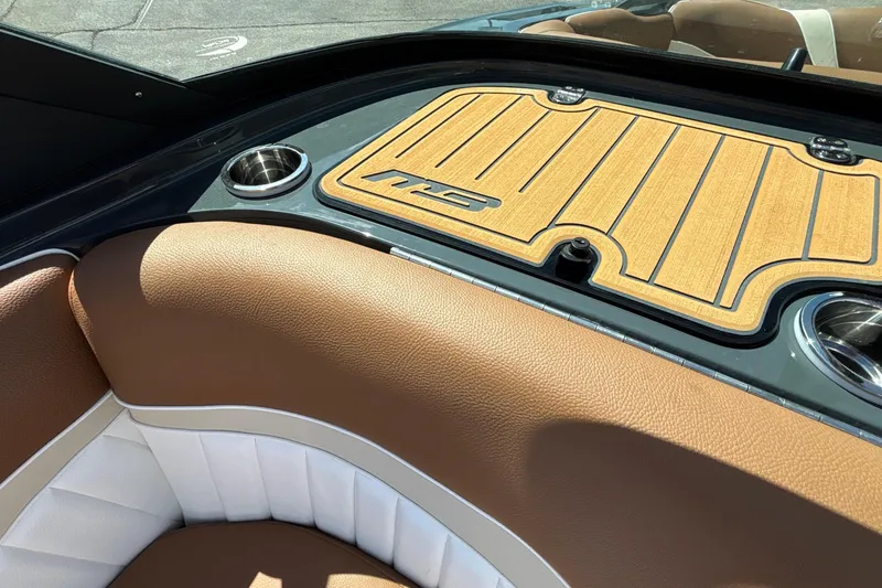 Slide: The Image of Luxurious interior of 2026 MB B52 23 Alpha boat with tan and white seating. - 35