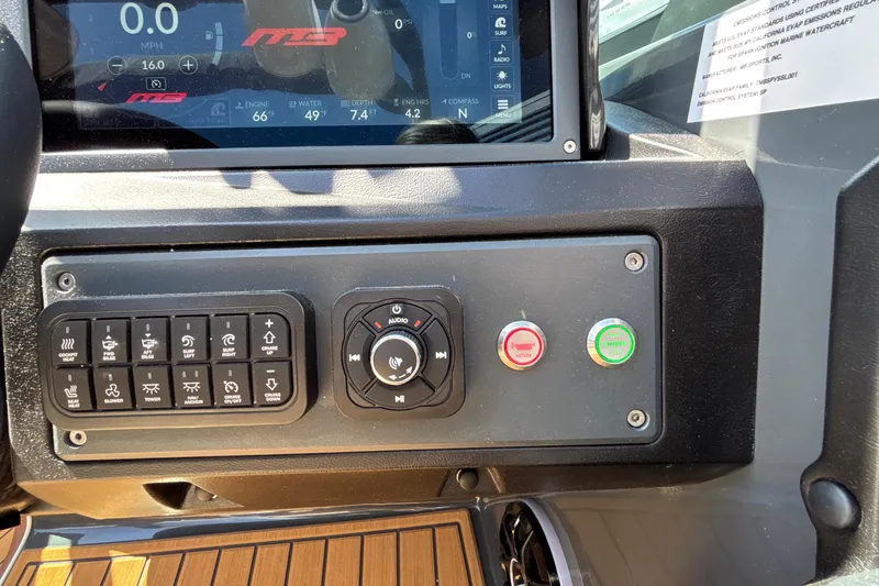 Slide: The Image of Control panel of 2026 MB B52 23 Alpha boat with digital display and buttons. - 42