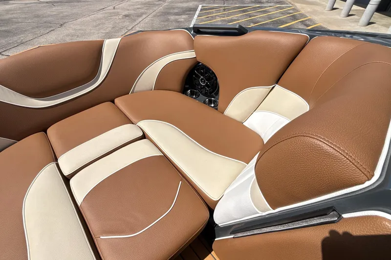 Slide: The Image of Luxurious brown and cream leather seating in 2026 MB B52 23 Alpha boat. - 52