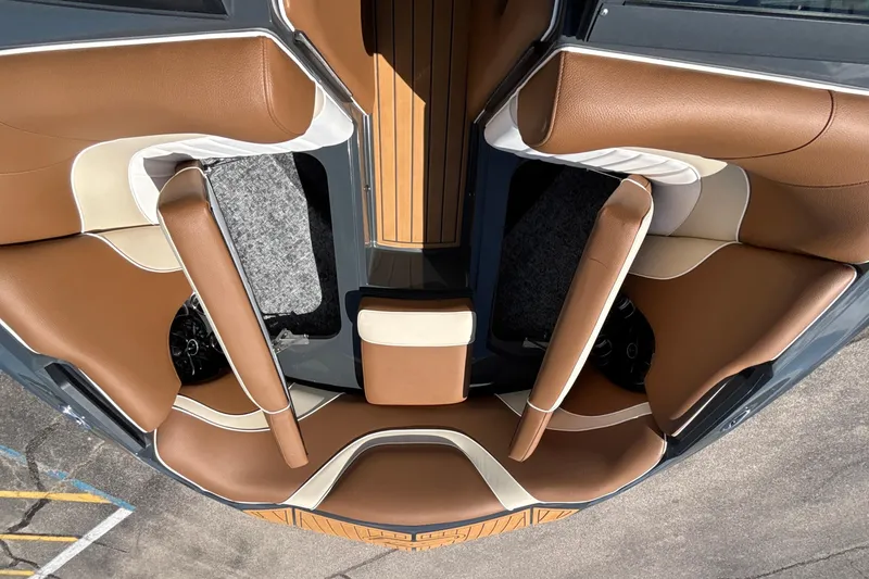 Slide: The Image of Luxurious interior of 2026 MB B52 23 Alpha boat with brown and cream seating. - 54