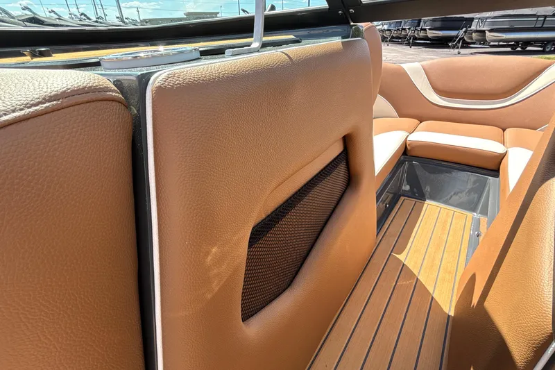 Slide: The Image of Luxurious interior of 2026 MB B52 23 Alpha boat with tan leather seating. - 59