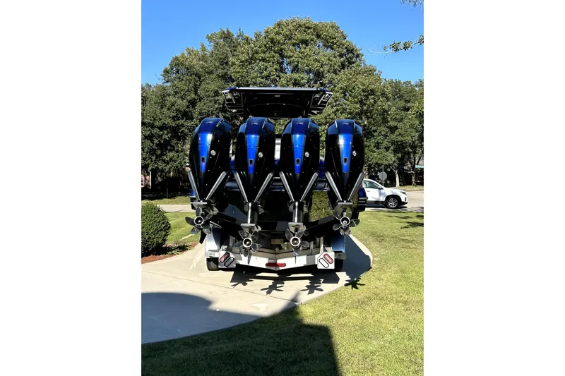 Slide: The Image of 2021 Nortech 390 Sport boat with four powerful outboard engines. - 7