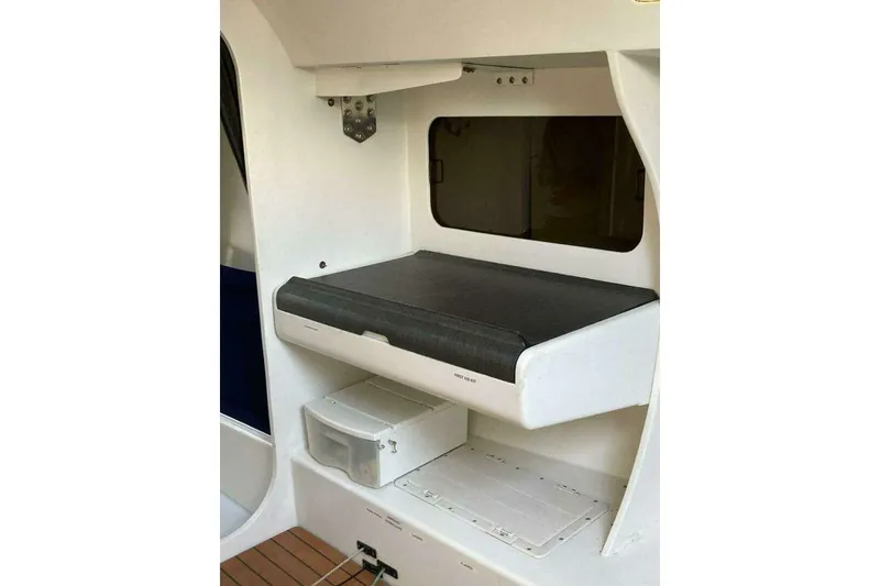 Slide: The Image of Interior of 1995 Nelson Marek 46 yacht with storage compartments and seating area. - 17