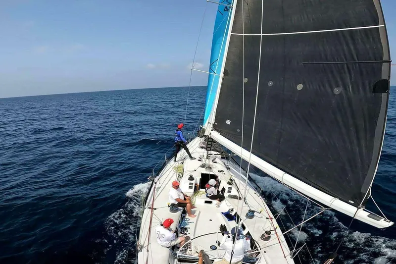 Slide: The Image of Sailing on a 1995 Nelson Marek 46 yacht with crew on open sea. - 5