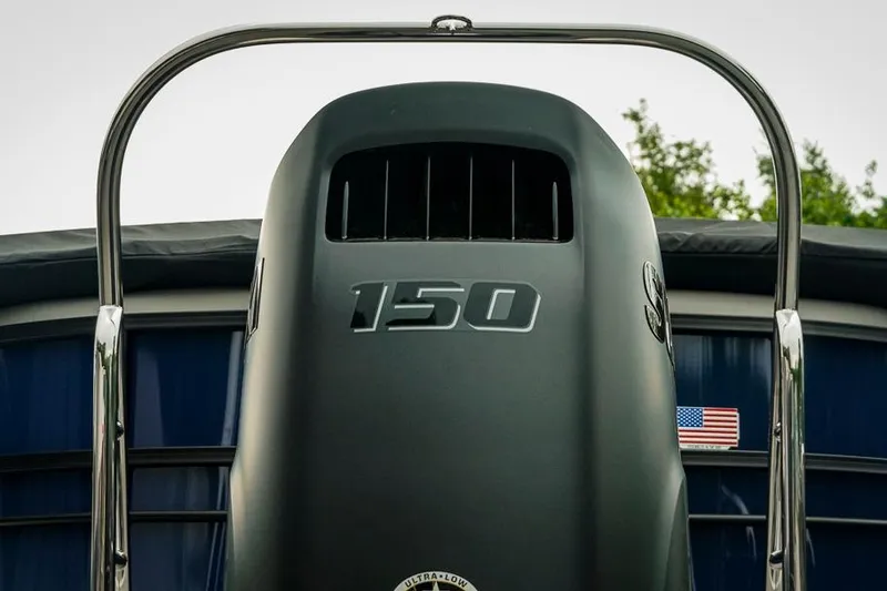 Slide: The Image of 2026 Trifecta LE 22RF boat engine with 150 horsepower, featuring sleek design and American flag. - 12