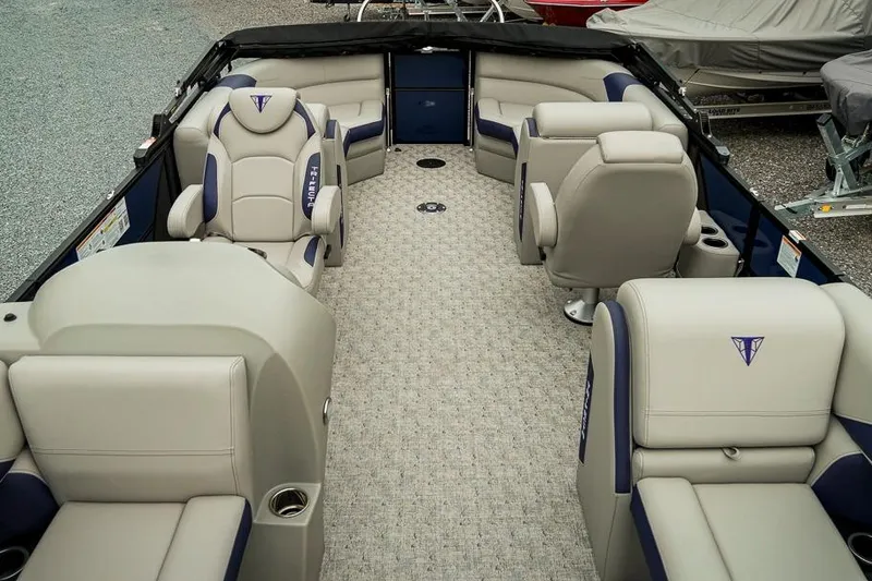 Slide: The Image of Luxurious interior of 2026 Trifecta LE 22RF pontoon boat with plush seating. - 14