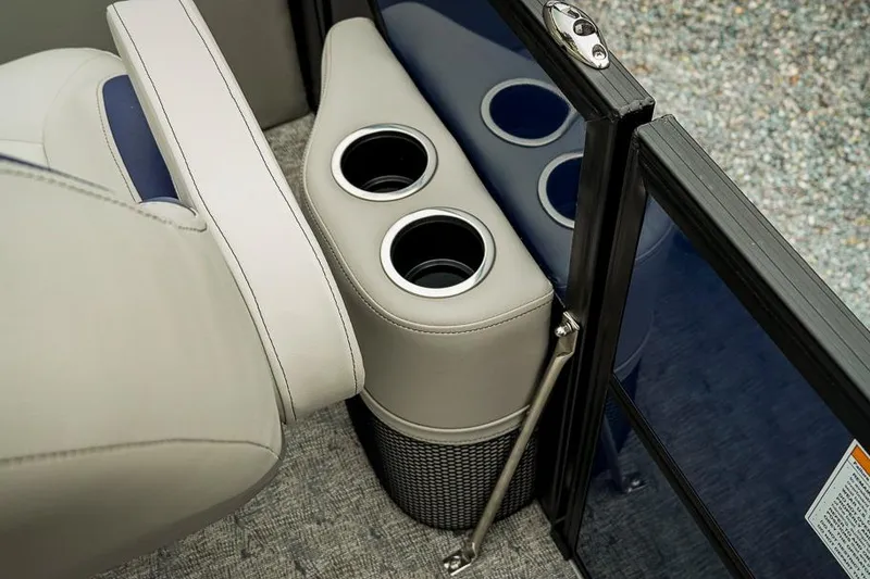 Slide: The Image of 2026 Trifecta LE 22RF boat interior with cup holders and seating detail. - 15