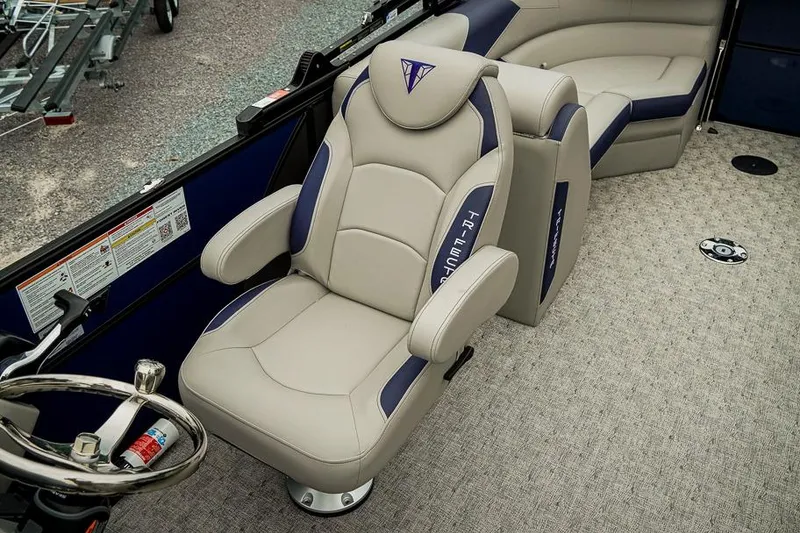 Slide: The Image of Luxurious seating in the 2026 Trifecta LE 22RF pontoon boat interior. - 17