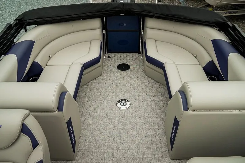 Slide: The Image of Luxurious interior of 2026 Trifecta LE 22RF pontoon boat with plush seating. - 19