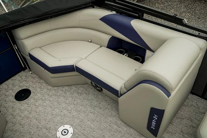 Slide: The Image of Luxurious seating on 2026 Trifecta LE 22RF pontoon boat with plush upholstery and cup holders. - 20