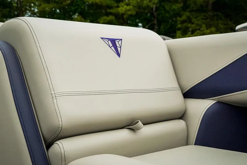Slide: The Image of 2026 Trifecta LE 22RF boat seat with elegant stitching and logo detail. - 21