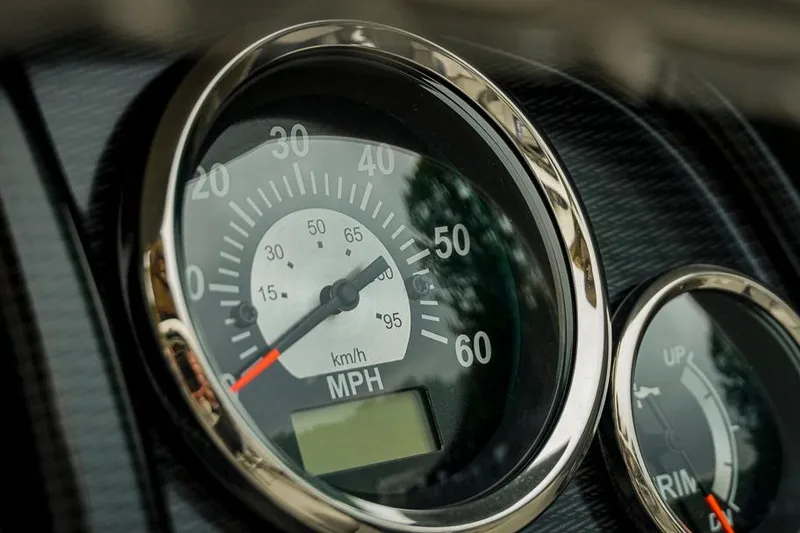 Slide: The Image of Close-up of 2026 Trifecta LE 22RF speedometer, displaying MPH and km/h. - 31