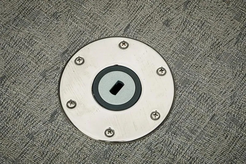 Slide: The Image of Round metal fixture on textured surface, Trifecta LE 22RF 2026 model. - 37