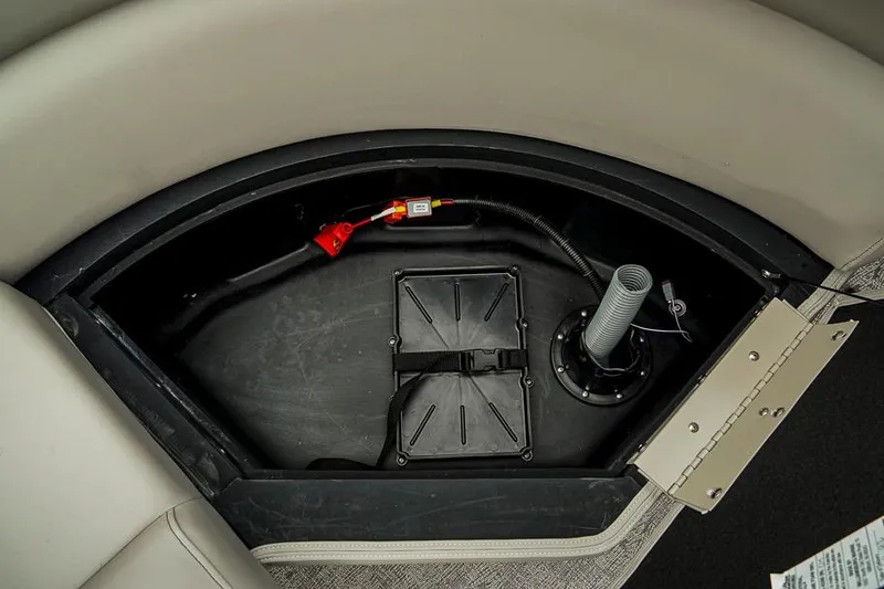 Slide: The Image of Storage compartment in 2026 Trifecta LE 22RF boat, featuring wiring and ventilation components. - 39