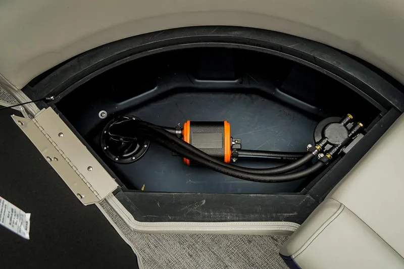 Slide: The Image of Storage compartment of 2026 Trifecta LE 22RF boat, featuring internal components and wiring. - 40