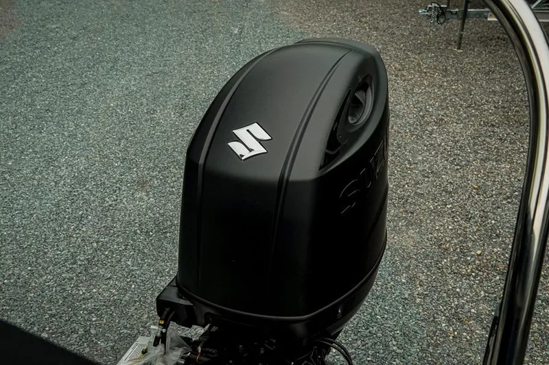 Slide: The Image of Black Suzuki outboard motor on a 2026 Trifecta LE 22RF boat. - 42