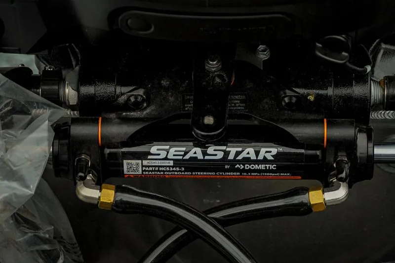 Slide: The Image of SeaStar hydraulic steering cylinder by Dometic, part of Trifecta LE 22RF 2026 model. - 43