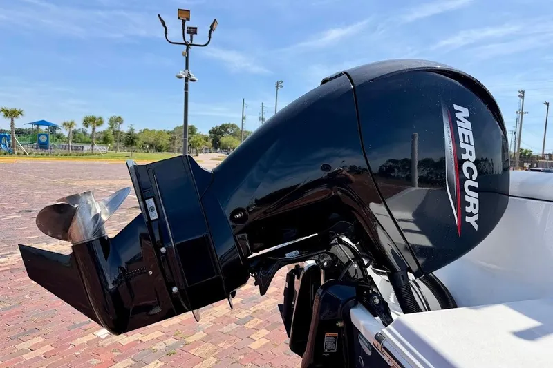Slide: The Image of Mercury outboard motor on 2020 Sportsman Heritage 211 Center Console boat. - 11